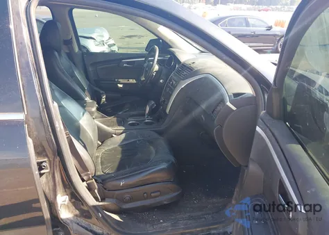 2012 Chevrolet Traverse 2Lt z USA, uszkodzony, nr VIN 1GNKRJED3CJ322928